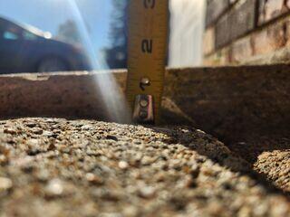 A close up of how far the slabs have sunken