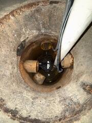 The old, inadequate sump pump allowed water to enter the basement.