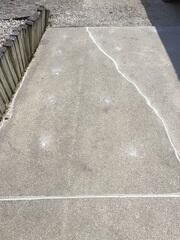 During: Our Foreman, Charlie, and his crew worked hard to secure the products below the sinking slabs.