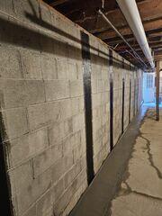 CarbonArmor wall straps to reinforce and stabilize the foundation wall