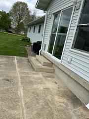 During: Our Foreman, Patrick, and his crew secured all the products below the struggling slabs.