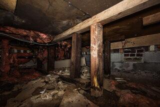 Damp conditions and a dirt floor created an unhealthy environment beneath the home.
