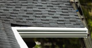 Upgraded gutters provide long-term protection against clogs and overflow.