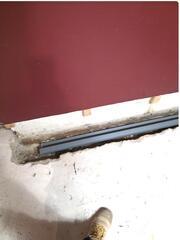 This is what it looks like when we install WaterGuard.It sits on top of the footer under the floor.