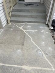 During: Our Foreman, Charlie, and his crew worked hard to secure the products below the sinking slabs.