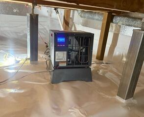 The SaniDry Sedona Dehumidifier will maintain a healthy air quality inside of this crawl space at all times.