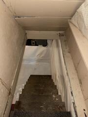 An encapsulation system designed to help isolate the basement from ground moisture and damp conditions