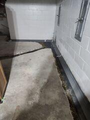 During: Our Foreman and his crew successfully secured all the waterproofing products throughout the basement.
