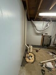During: Our Foreman, Kingsley, and his crew worked hard to secure all the products in the basement.