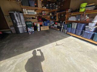 The garage began sinking causing cracks to form