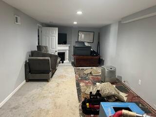 The basement where it showed signs of water leaks along the edges of the floor