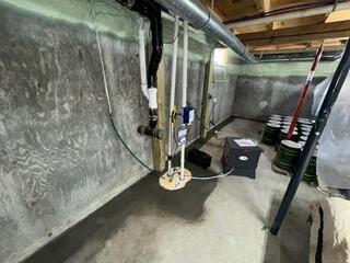 WaterGuard® Interior Drainage System
Installed along the basement perimeter to collect water from the wall and floor joint before it could spread across the basement floor.
TripleSafe® Sump Pump System
Installed to provide dependable pumping protection and remove collected water from the basement.
