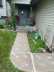 After our crew lifted and leveled the slabs with PolyLevel and sealed the cracks and joints with NexusPro