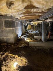 A row of our SmartJacks installed in this crawl space.