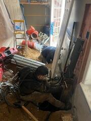 Installation process of the push piers in order to repair the foundation of the home in Woodbridge, VA