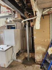 Post-Install: The basement is now properly supporting the rest of the home thanks to SmartJacks.