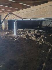 Our SmartJack system stabilizes crawl space floor joists and provides lift to the floors above.