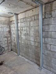 After our crew installed PowerBrace agains the walls to stop further movement