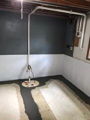 After our crew installed SuperSump+, CleanSpace, and WaterGuard, the flooring was restored.