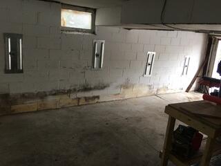 The anchors successfully installed to stabilize the foundation