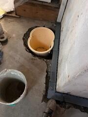 Mid-Install: WaterGuard and Sump are placed, waiting for battery to be added and covered in cement.