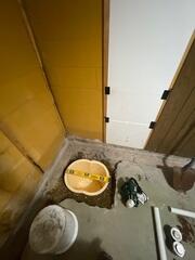 Our crew in the process of installing the components of the sump pump