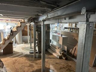 After our crew replaced them with our SmartJacks to lift the floor back to level