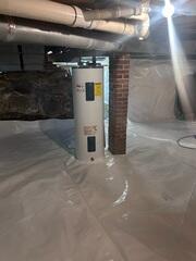 CleanSpace: A durable crawl space liner installed across the floor and walls to create a cleaner, brighter barrier between the home and the exposed ground.
Drainage Matting: Installed beneath the liner in key areas to help direct water below the encapsulation system.
Sump Pump System: Installed to collect and pump water out of the crawl space.