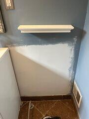 Drywall Doctor repaired the wall and got it smooth, ready for paint.