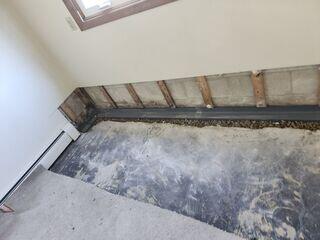 WaterGuard is added along the edges of the floor into the area thats drilled