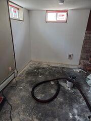 Before: Our Design Specialist, Dylan, recommended securing waterproofing products throughout the basement.