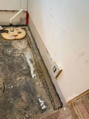 During: Our Foreman, Kingsley, and his crew worked hard to secure all the products throughout the basement.