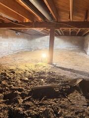 During: Our Foreman, Raul, and his crew worked hard to properly repair the crawl space.