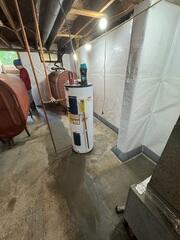 The CleanSpace Wall System was installed along the basement walls to help create a cleaner, brighter surface while working with the waterproofing system. When water enters through the foundation wall, CleanSpace helps direct it down into the drainage system rather than allowing it to spread across the basement floor or continue staining the wall surface.
Interior Basement Drainage System
The interior drainage system was installed along the basement perimeter to collect water at the base of the foundation wall. Once water enters the drainage system, it is directed to the sump pump system so it can be removed from the basement before reaching the main floor.
