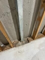 During: Our Foreman, Kingsley, and his crew worked hard to secure all the products throughout the basement.
