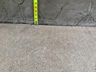 A close-up to show how much the slabs along the walkway had sunken.
