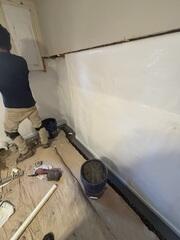 Waterguard and Clean Space Vapor Barrier process of being installed.