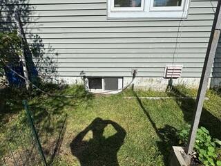 This Colchester, Vermont, home will have its basement windows upgraded to an egress window.