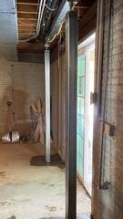 Supplemental beam placed to support the floors above the sliding doors in the basement. Smart jacks supported the beam.