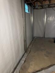 During: Our Design Specialist, Ian, recommended securing several waterproofing and foundation repair products throughout the basement.