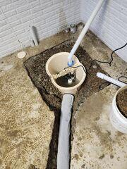 During: Our Foreman, Lane, and his crew took out the old sump pump and replaced it with the TripleSafe Sump Pump.