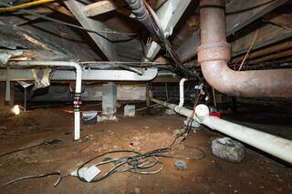 The homeowner had a dirt crawl space where persistent dampness created an environment that needed long-term protection.