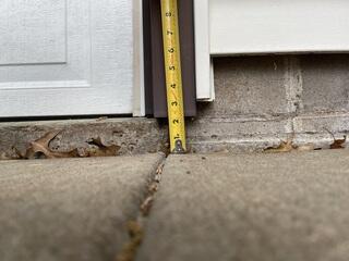The top of the driveway where a bump had formed