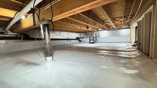 Our team encapsulated the dirt crawl space with CleanSpace, installed SilverGlo insulation, and added a SaniDry Sedona dehumidifier to help control humidity year-round.