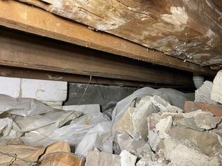 This nasty crawl space in Granville, Vermont, will undergo an intense transformation into a dry, clean, usable space.