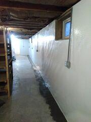 During: Our Foreman, Matt, and his crew worked hard to secure all the products throughout the basement.