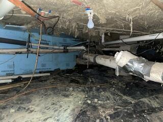 This nasty crawl space in East Dorset, Vermont, was giving the homeowners nasty smells and high humidity. Causing the air in the home to be unhealthy.
