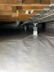 During: Our Foreman, Kiko, and his crew worked hard to secure all the products in the basement.