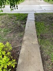 During: Our Foreman, Jordan, and his crew worked hard to lift and level the walkway back to its original position.