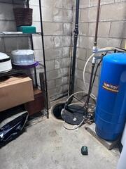 The old basement sump pump needed an upgrade to ensure it kept up with the WaterGuard drainage system.